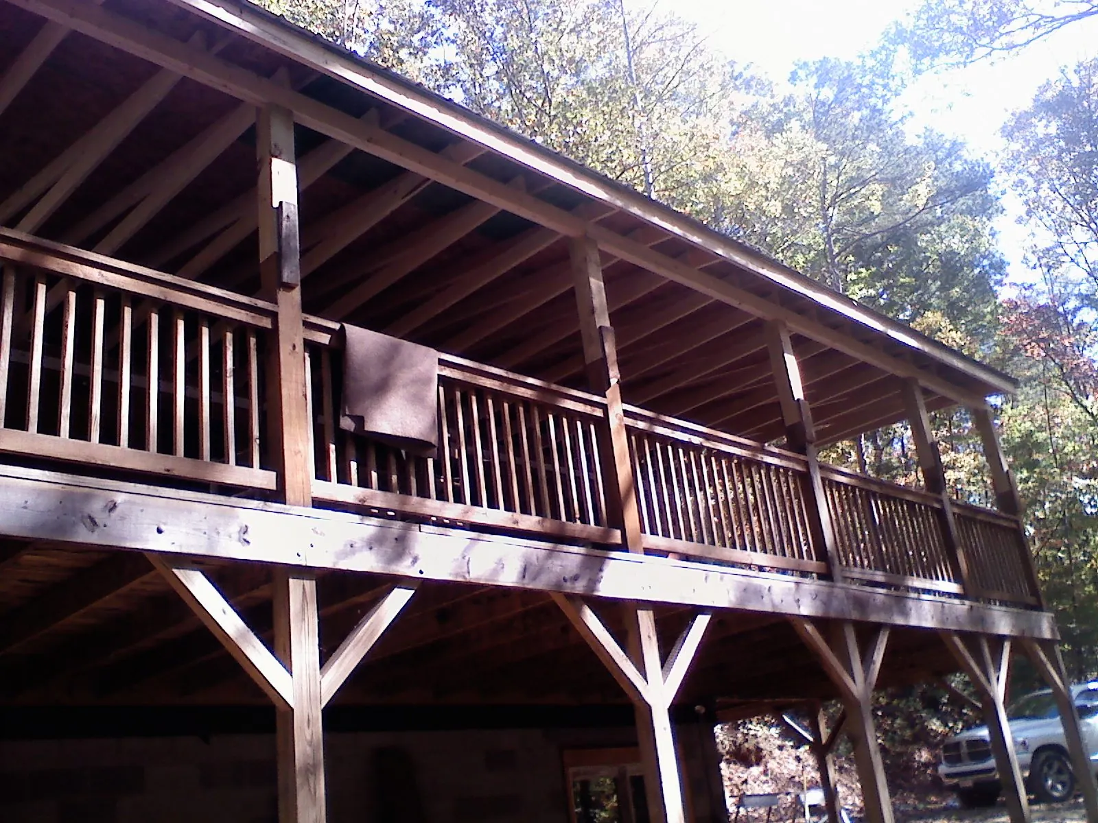 Timber framing under a new elevated porch and deck — Roof Leak Repair in Badger by Roofing Brothers